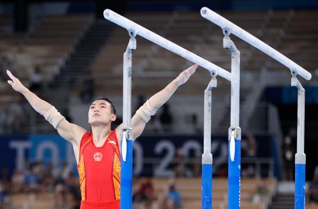 C7游戏入口-邹敬园双杠决战无敌夺冠 体操队巴黎争金还看他?